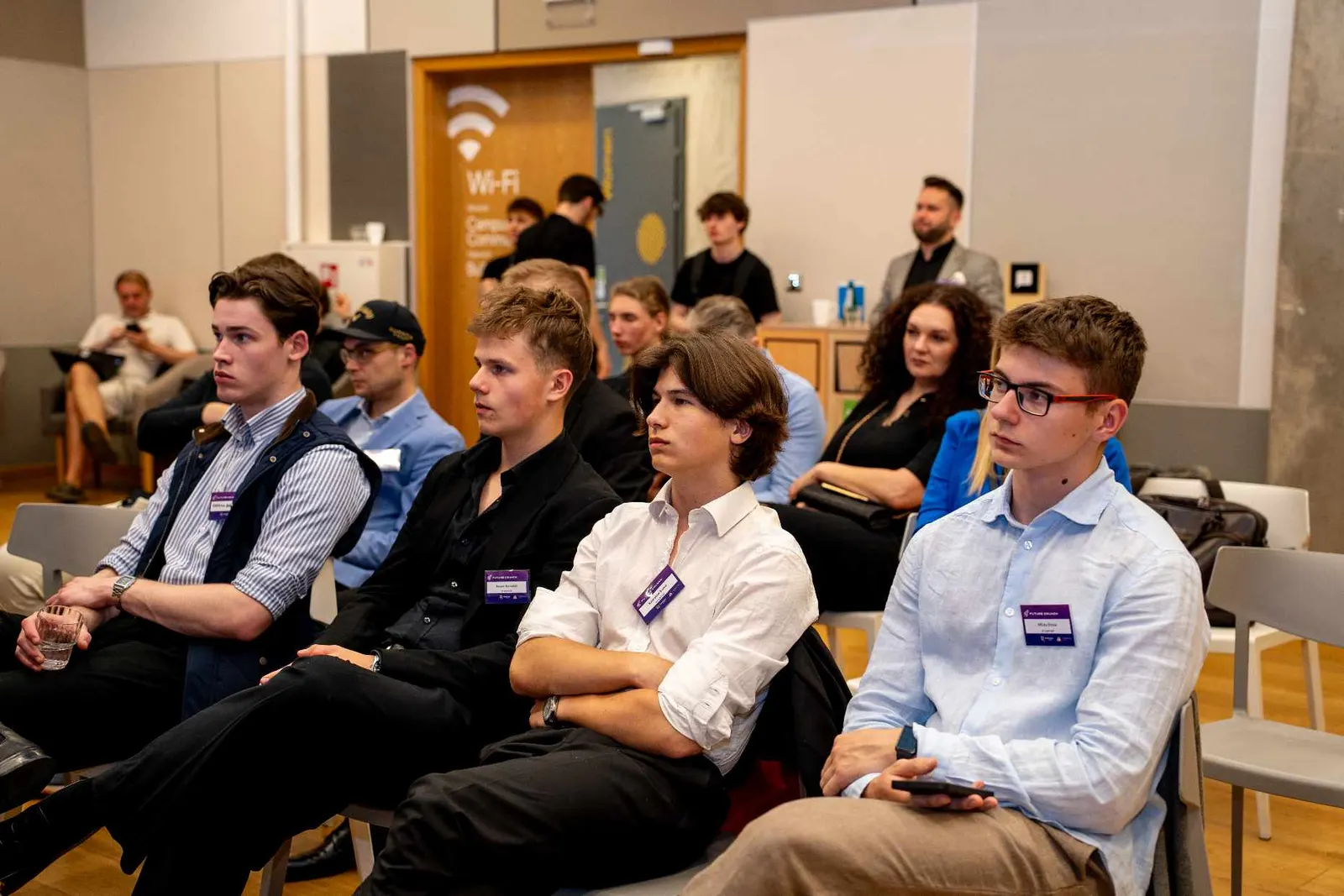 Audience listening to a presentation