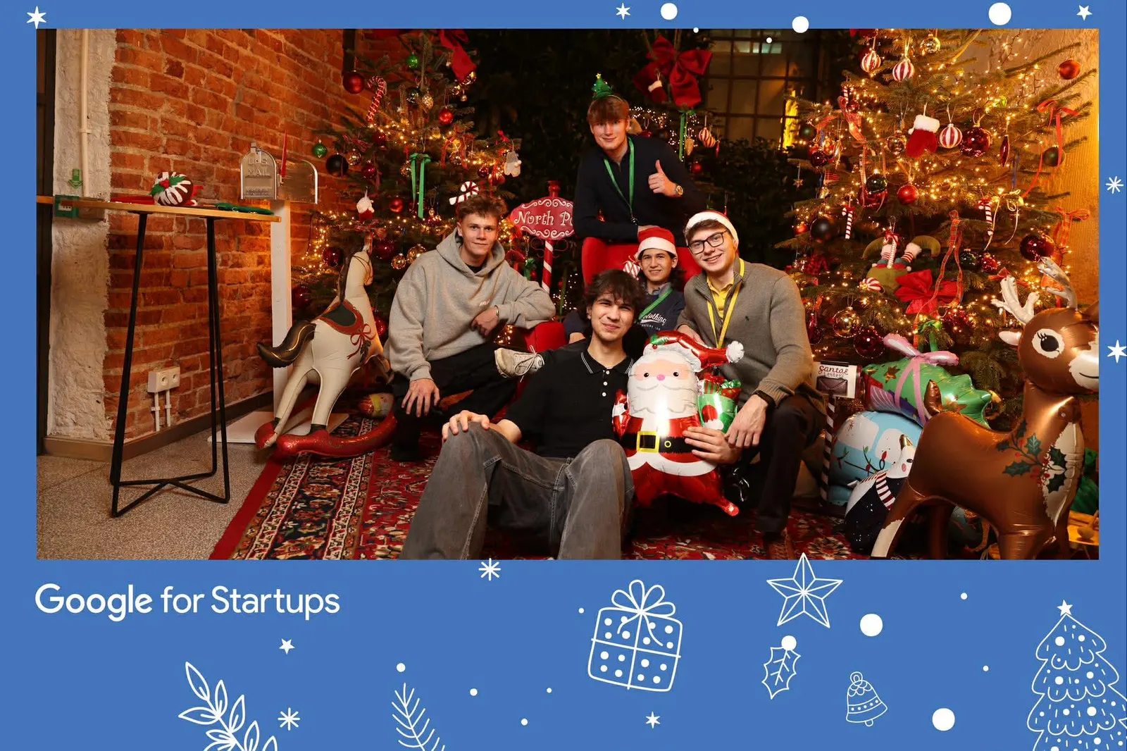 The Codaro team by the Christmas trees at a Google for Startups party